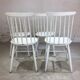 Lot of 4 white wooden chairs