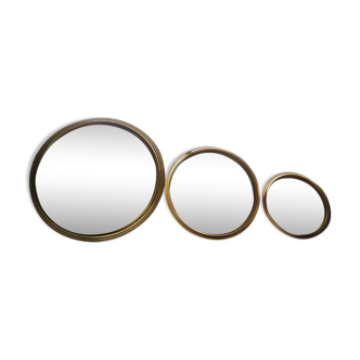 Suite de trois miroirs en laiton