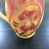 Old pitcher with pink iris decor