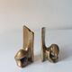 Super rare pair of brutalist brass bookends by David Marshall.