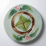 Polychrome slipware dessert plate, with a floral decoration, early 20th century.
