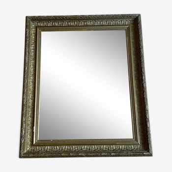 Old mirror with golden wooden frame