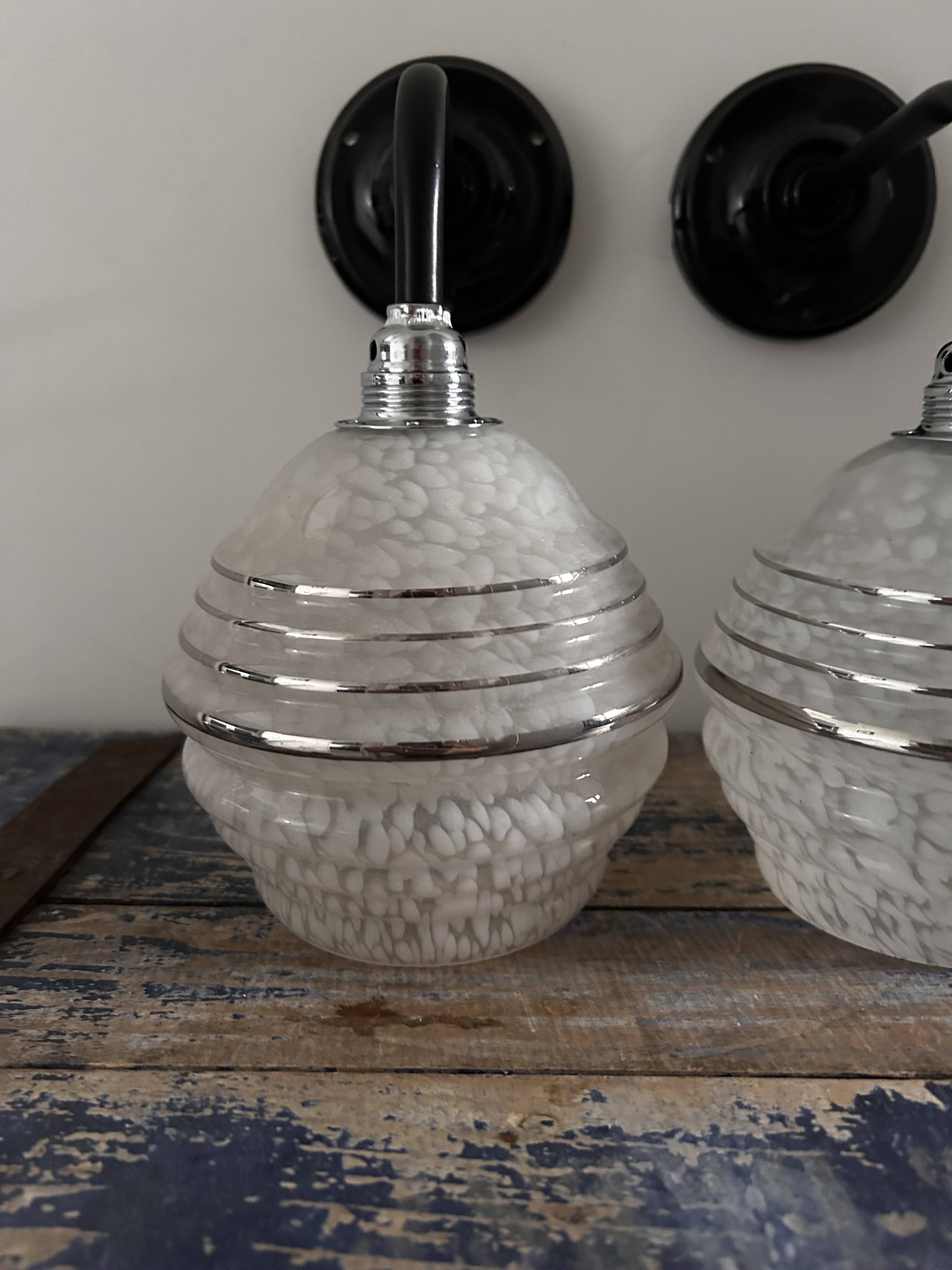 Pair of white, black and silver Art Deco wall lights