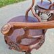 Pair of antique Chinese carved mahogany armchairs, circa 1960s