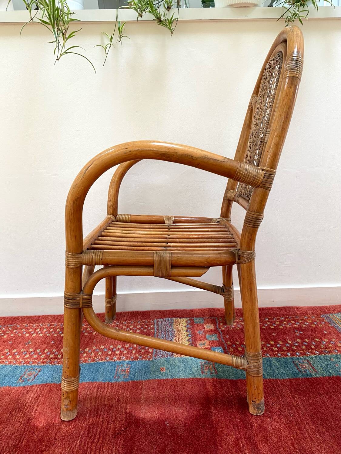 Vintage rattan and bamboo armchair from the 1970s.