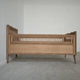 Children's bed in wood and sandblasted rattan from the 1960s.