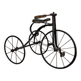 Children's tricycle made of wrought iron, around 1900.