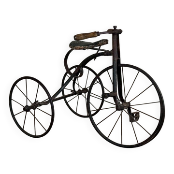 Children's tricycle made of wrought iron, around 1900.
