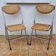 Pair of vintage metal and cane folding chairs