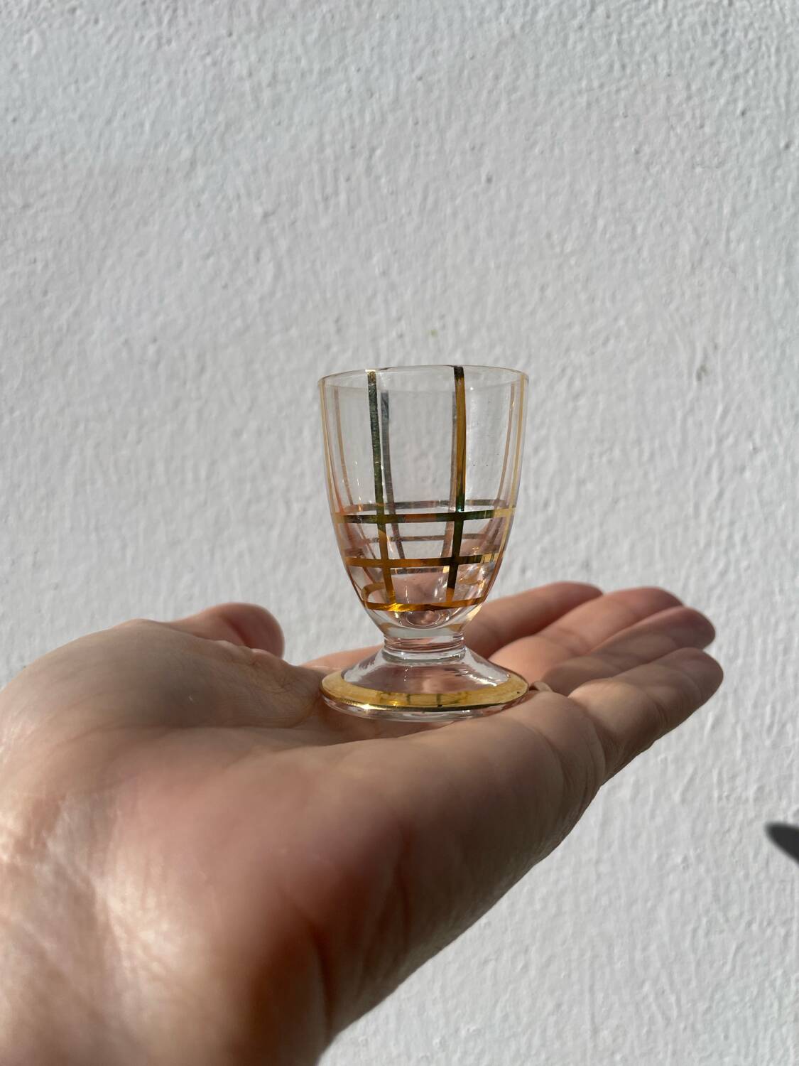 Art Deco glass and gold carafe or vase from the 1950s.