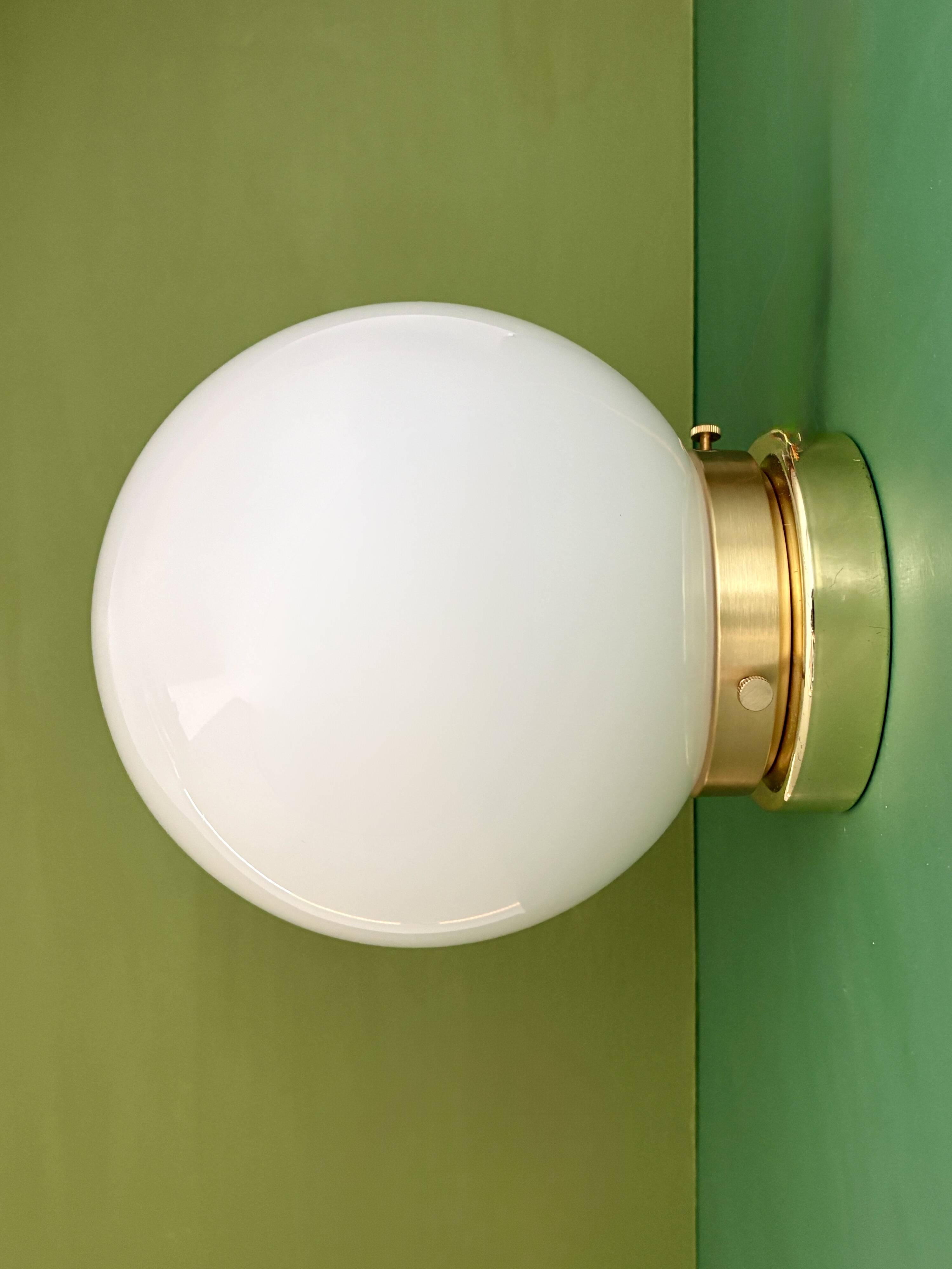 Vintage wall or ceiling light globe in white opaline.