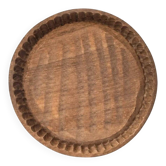 Ancient wooden plateau hand-carved