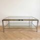 Vintage 1970s coffee table in brass and chrome in the style of Willy Rizzo.