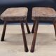 Pair of solid octagon cowhide tripod stools