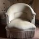 Old toad armchair in beige velvet