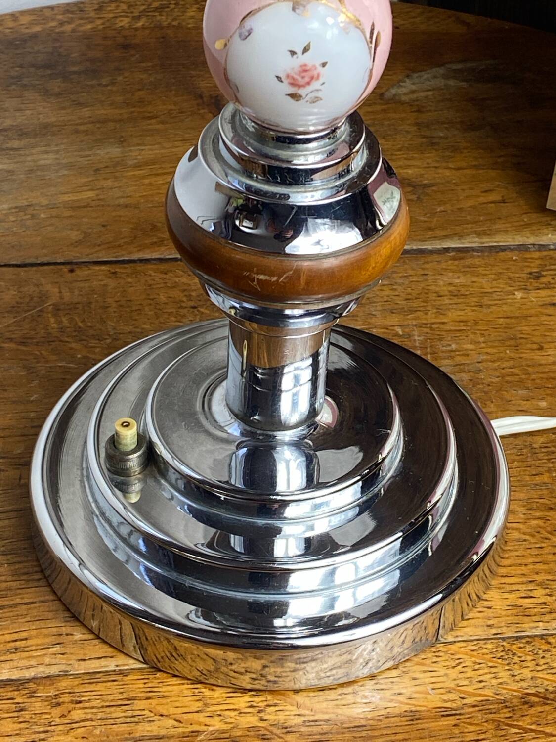 Lamp base in chrome metal, porcelain and wood.