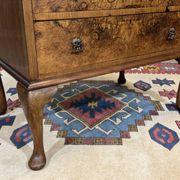 Scriban in English with a walnut finish from the 1930s.