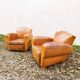 Paire de fauteuils club Moustache vintage cuir fauve