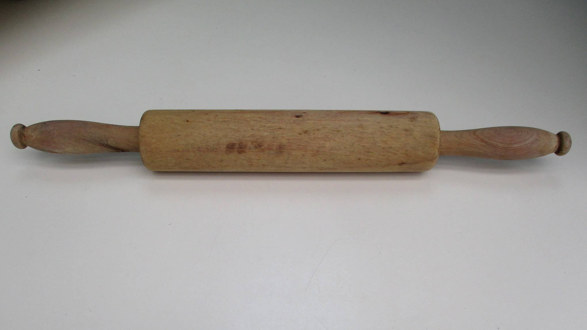Vintage rolling pin, made of wood.