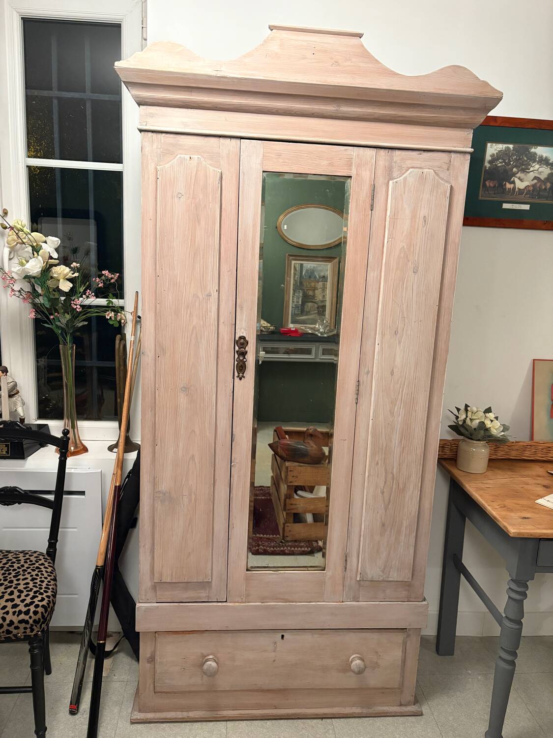 Antique English wardrobe in pale pink patina.