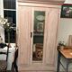 Antique English wardrobe in pale pink patina.
