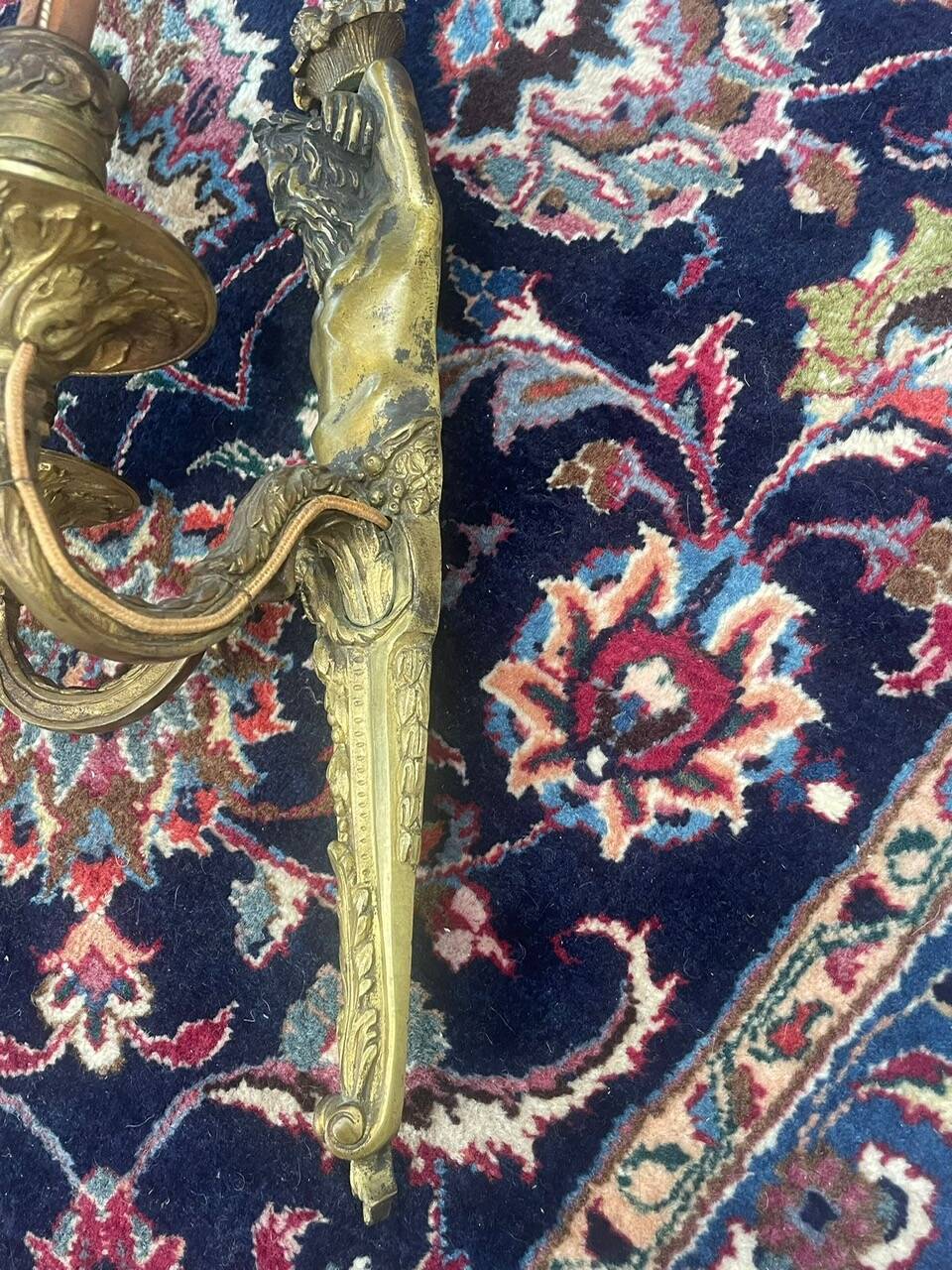 Pair of gilt bronze wall sconces with caryatid and Atlante decoration, 18th century.