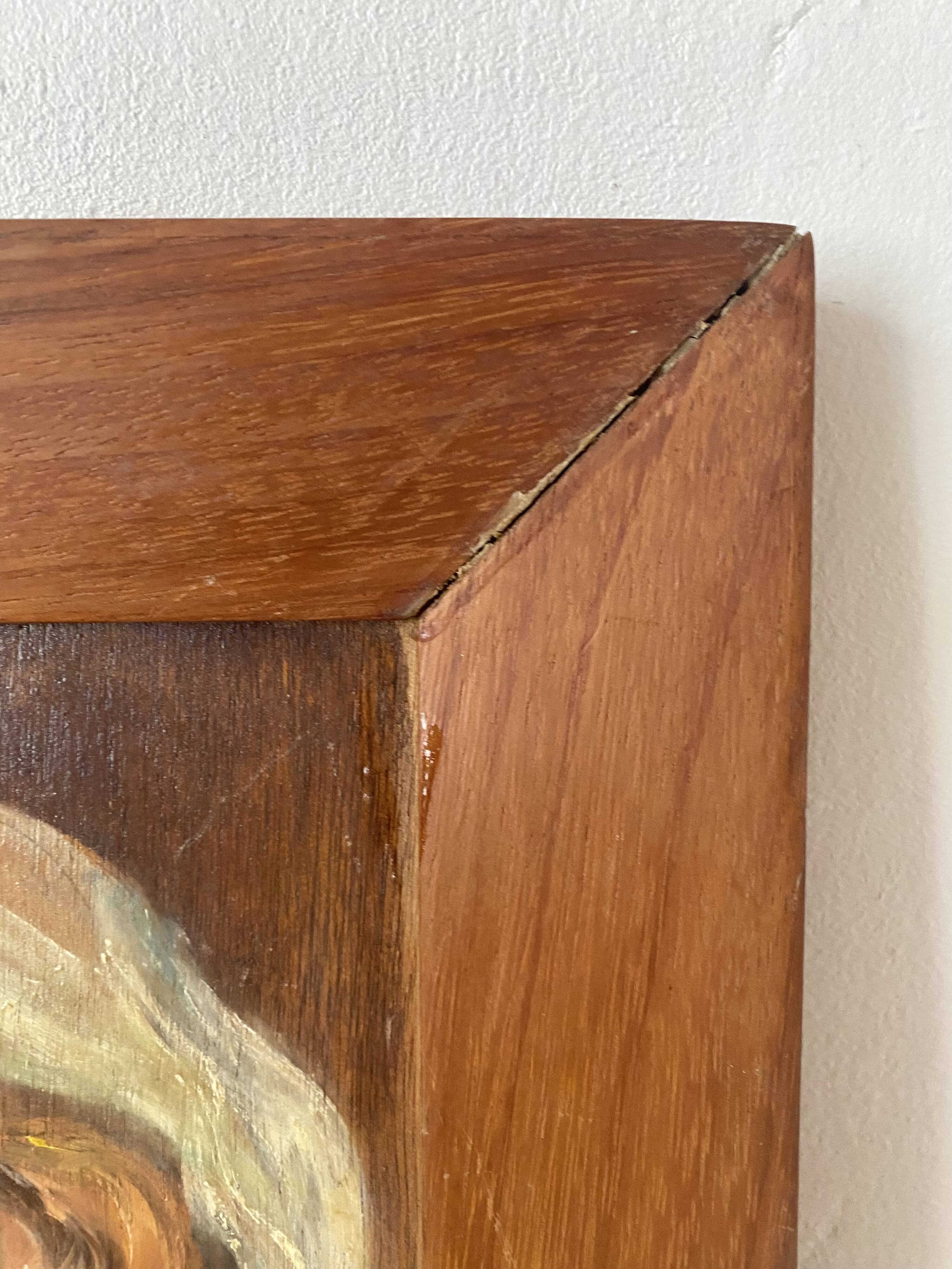 Old oil portrait on wood of a young woman