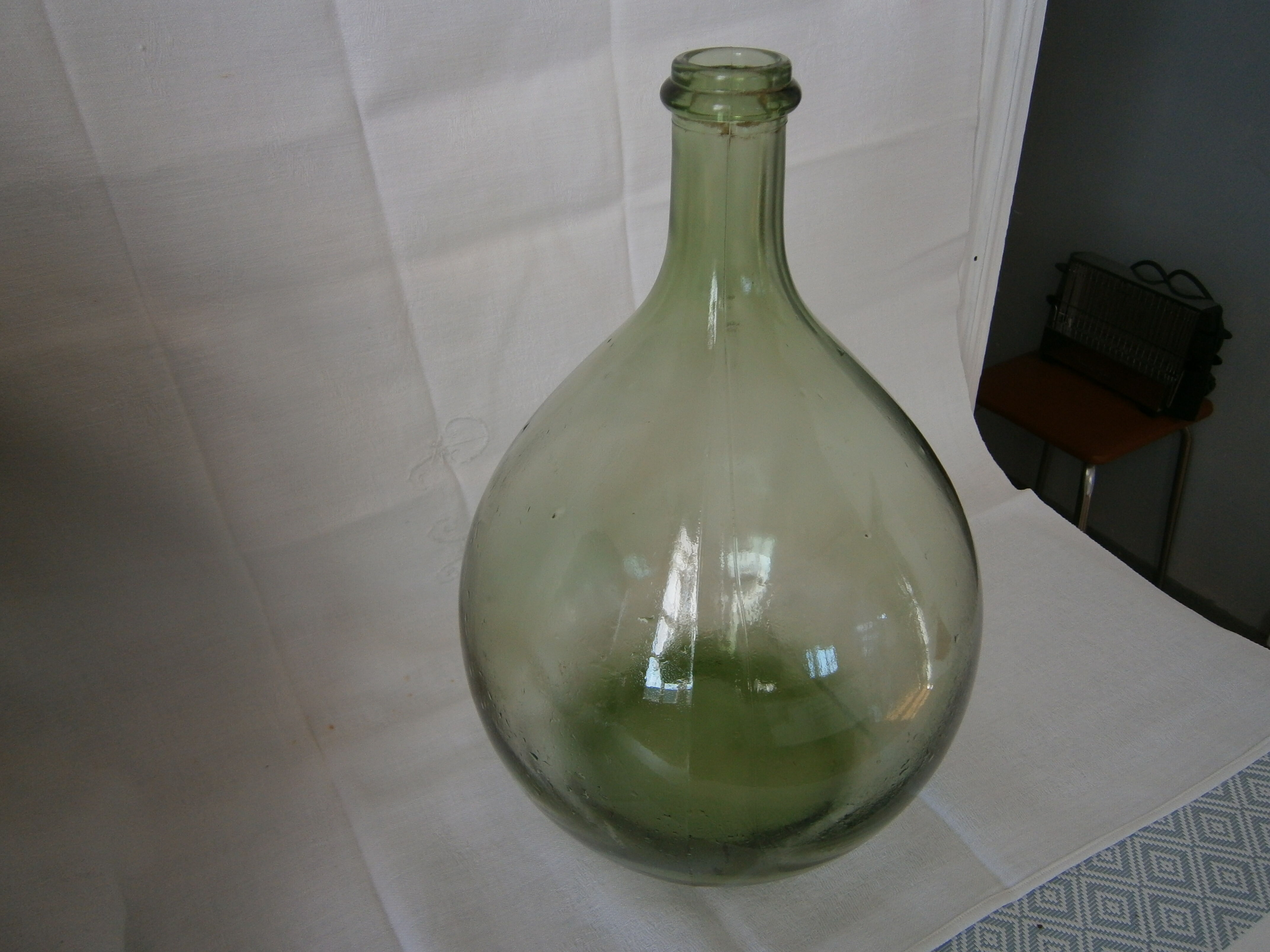 Demijohn canister