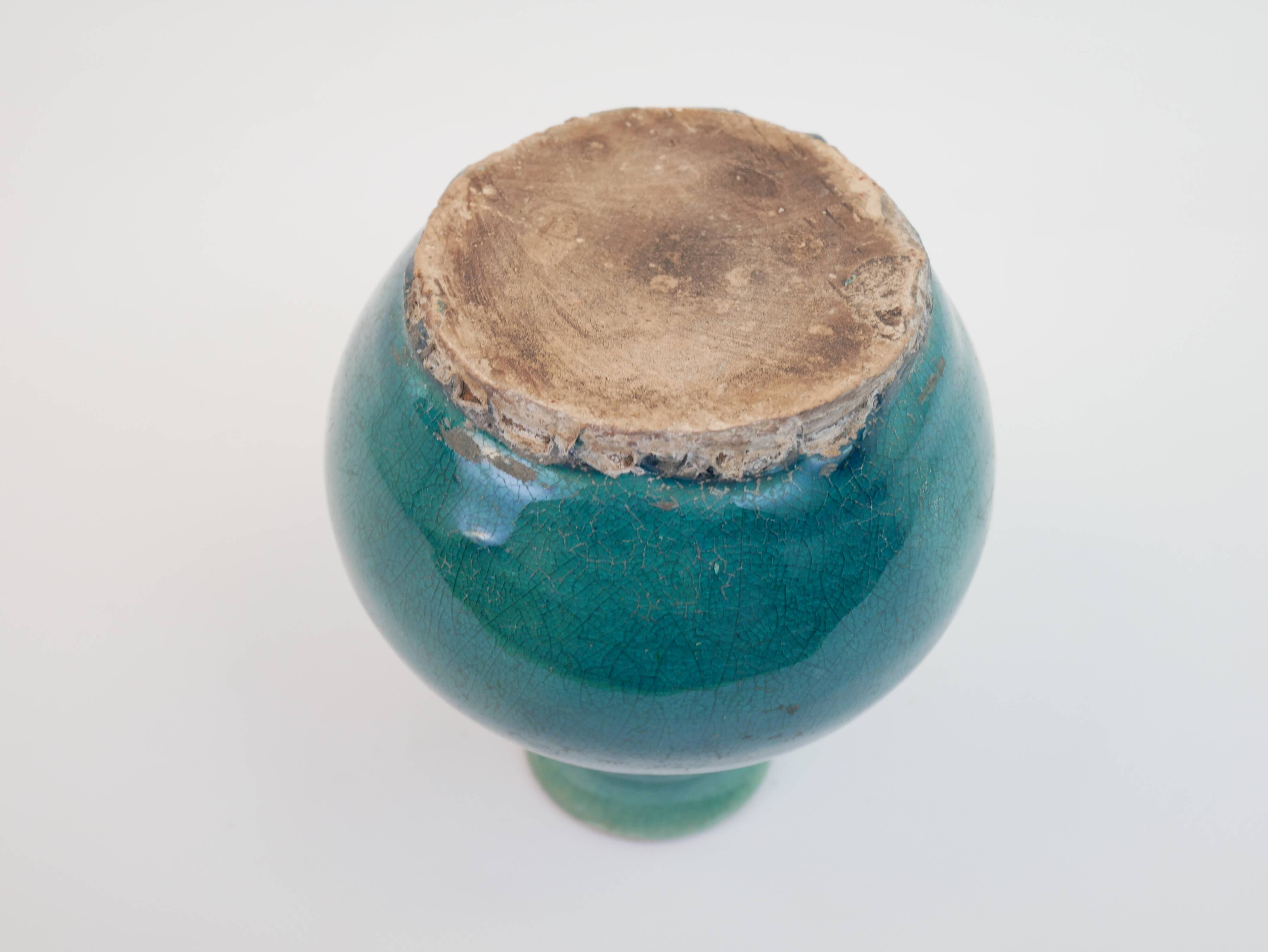 Small old blue ceramic vase