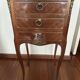 Small bedside table in marquetry in the Louis XV style.