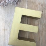 Golden vintage sign letter E