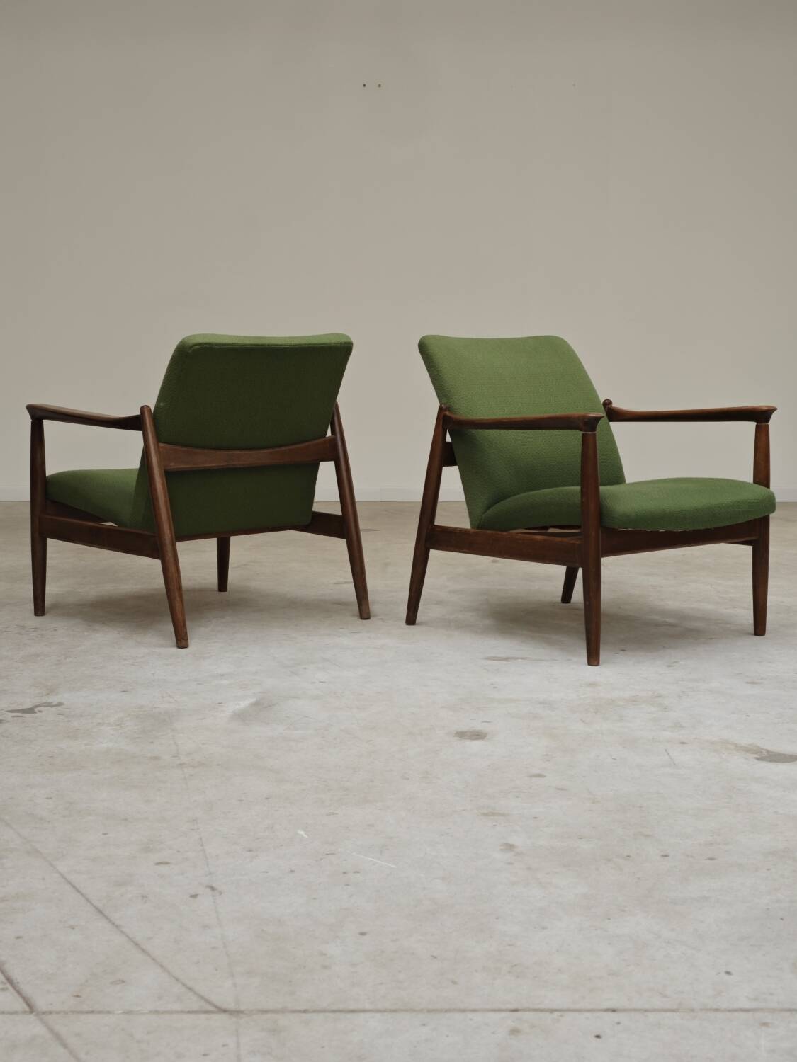 Pair of green GMF 64 armchairs by
Edmund Homa, Poland, 1960s