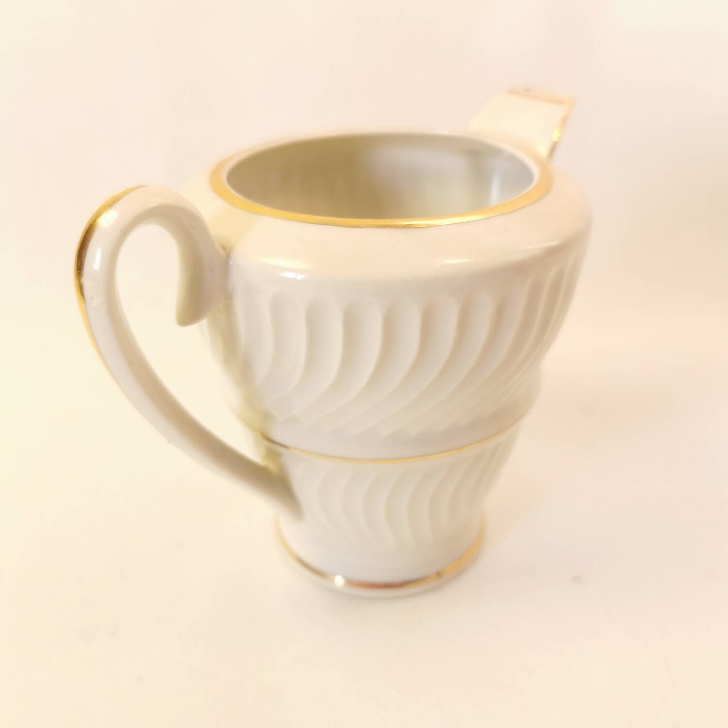 art deco porcelain milk jug with gold edging