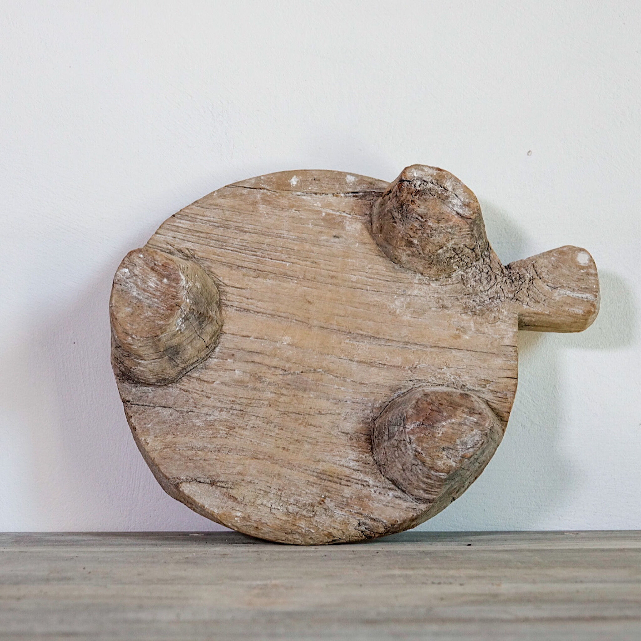 Carved wooden chapatis board