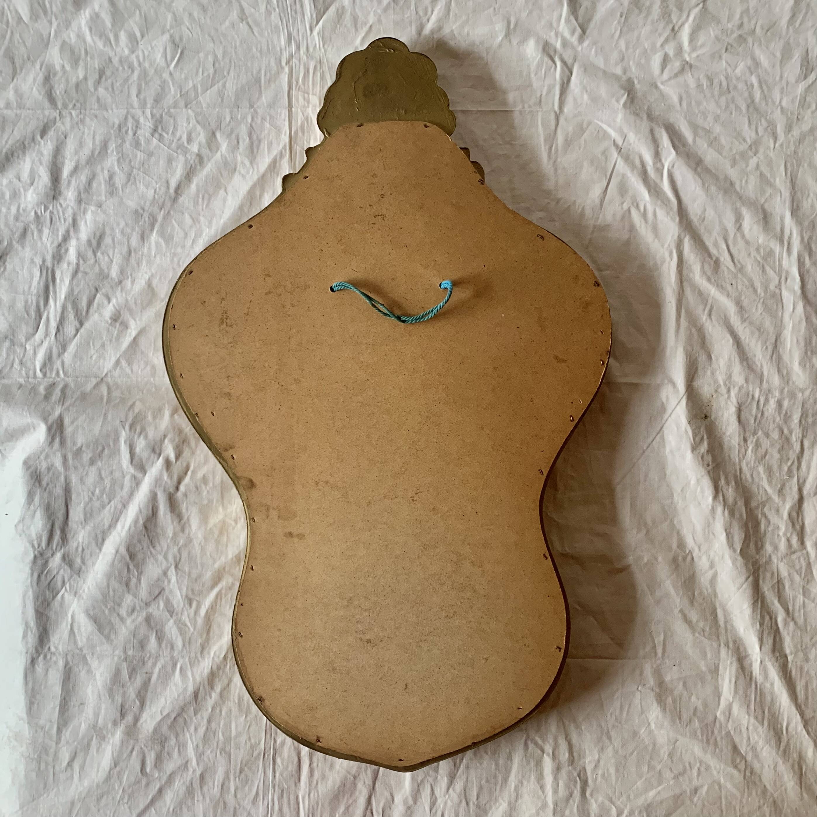 Large rococo mirror in gilded wood