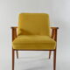 Fauteuil 366 signé J.Chierowski jaune et oiseaux