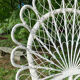 Fauteuil rotin peacock années 60