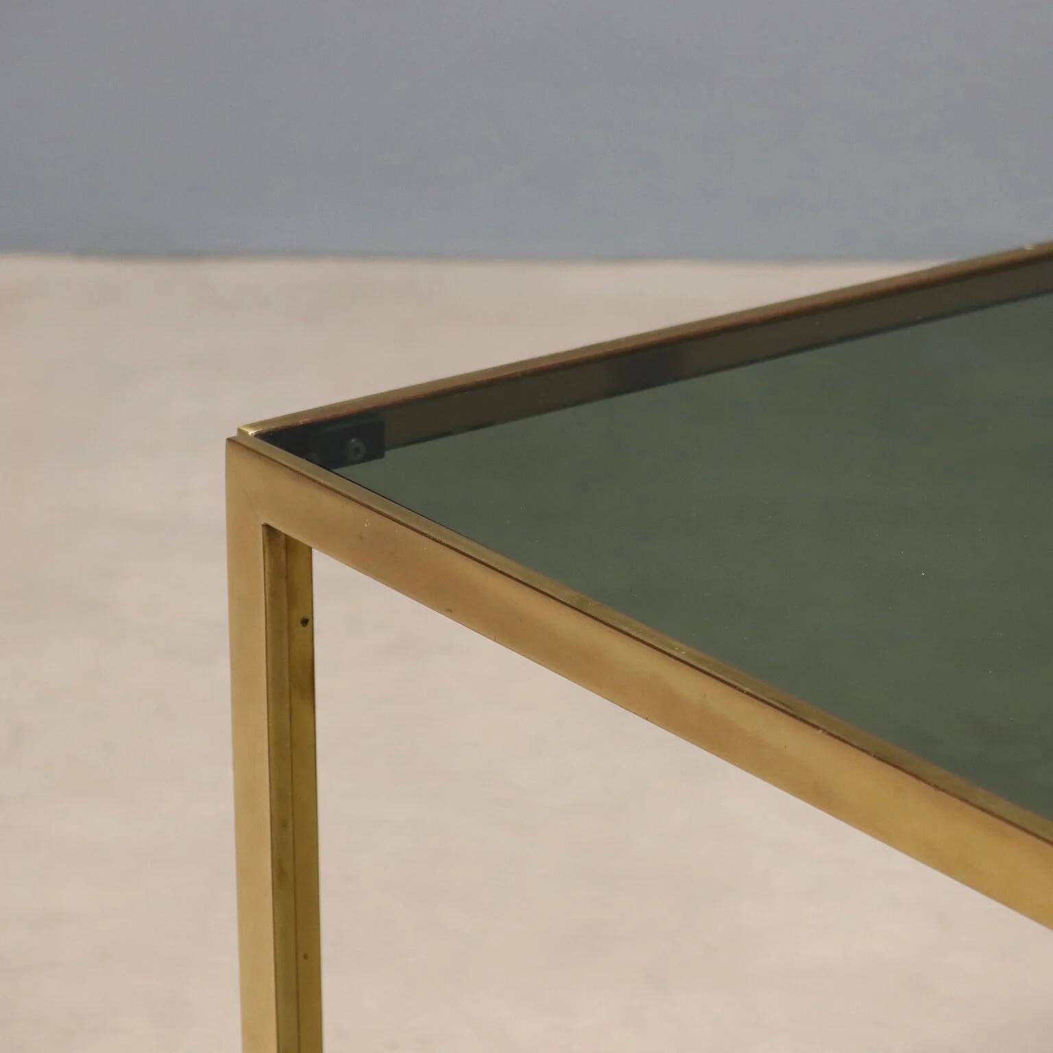 Vintage coffee table in brass and smoked glass, 1970s design.