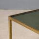 Vintage coffee table in brass and smoked glass, 1970s design.
