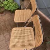 Plia chairs by Castelli in wood and cane.