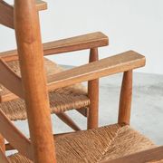 Set of 2 oak and wicker armchairs, mid-20th century.