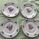 Set of 4 flat plates, in art deco porcelain