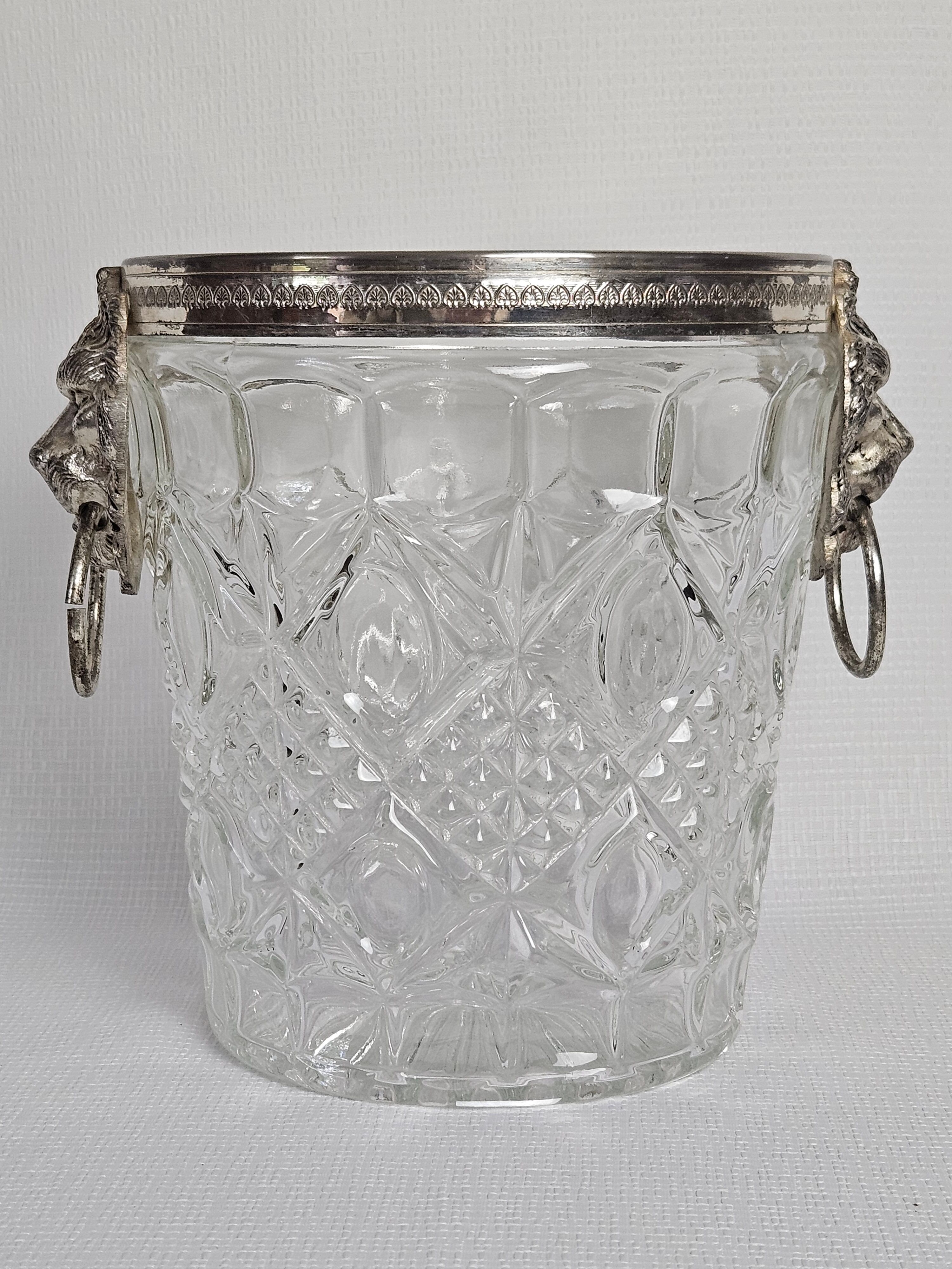 Lion head champagne bucket and its stand 20th century
