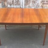 Extendable teak dining table
