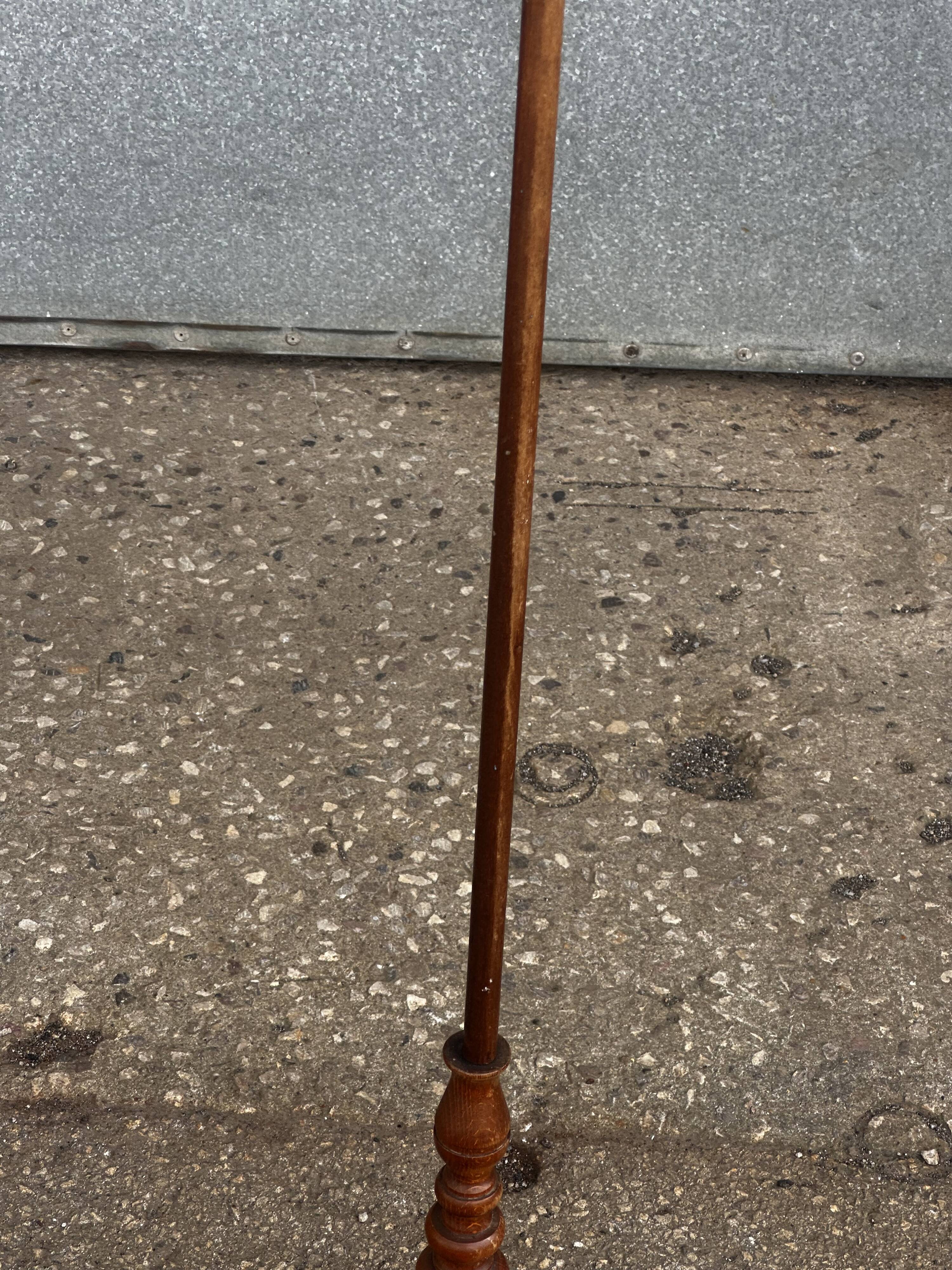 Turned wooden floor lamp from the 1950s.