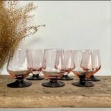 6 small pink glasses with black stems