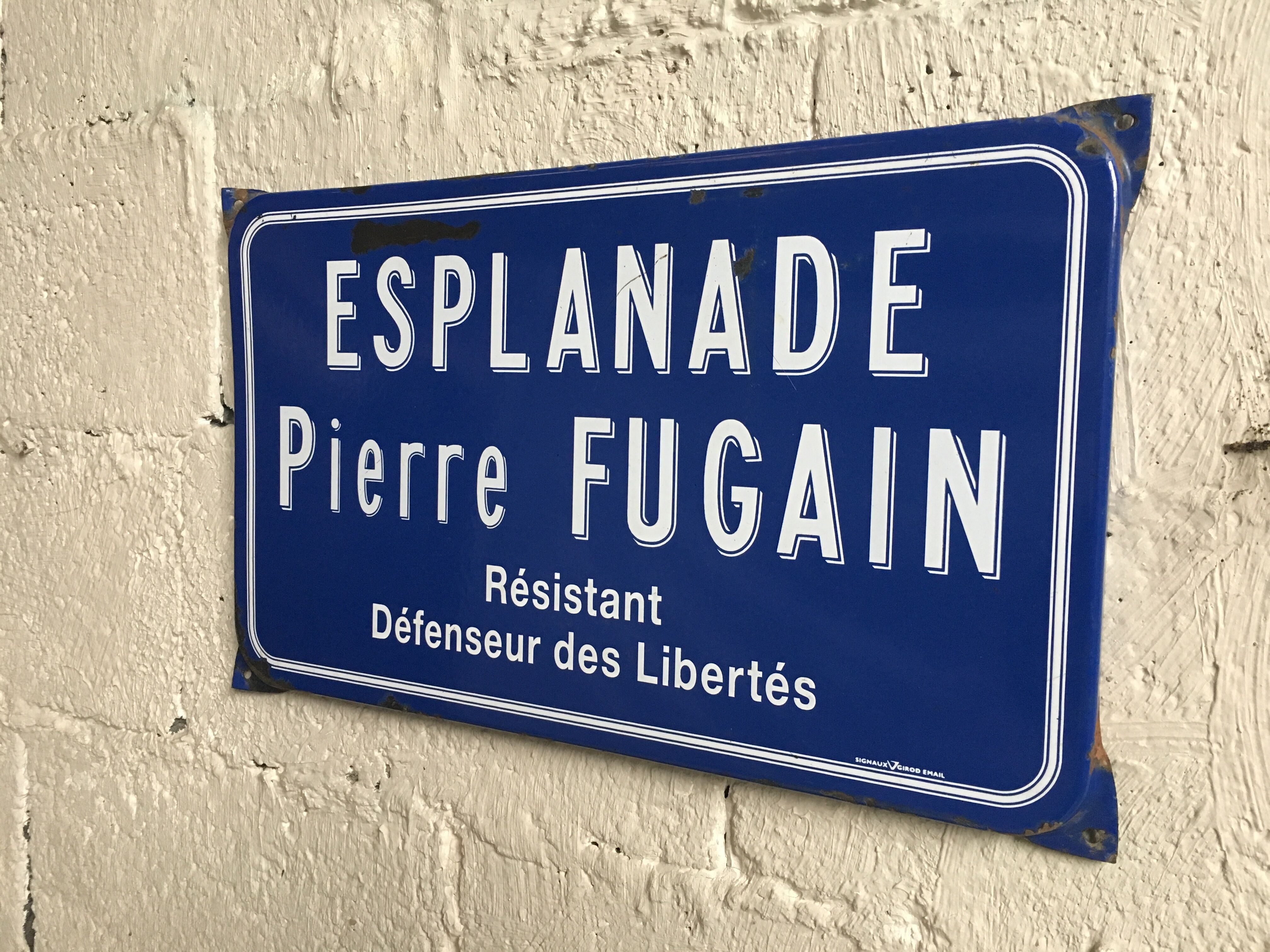 Enamelled old street sign