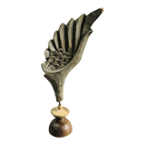 Old wooden wing on pedestal