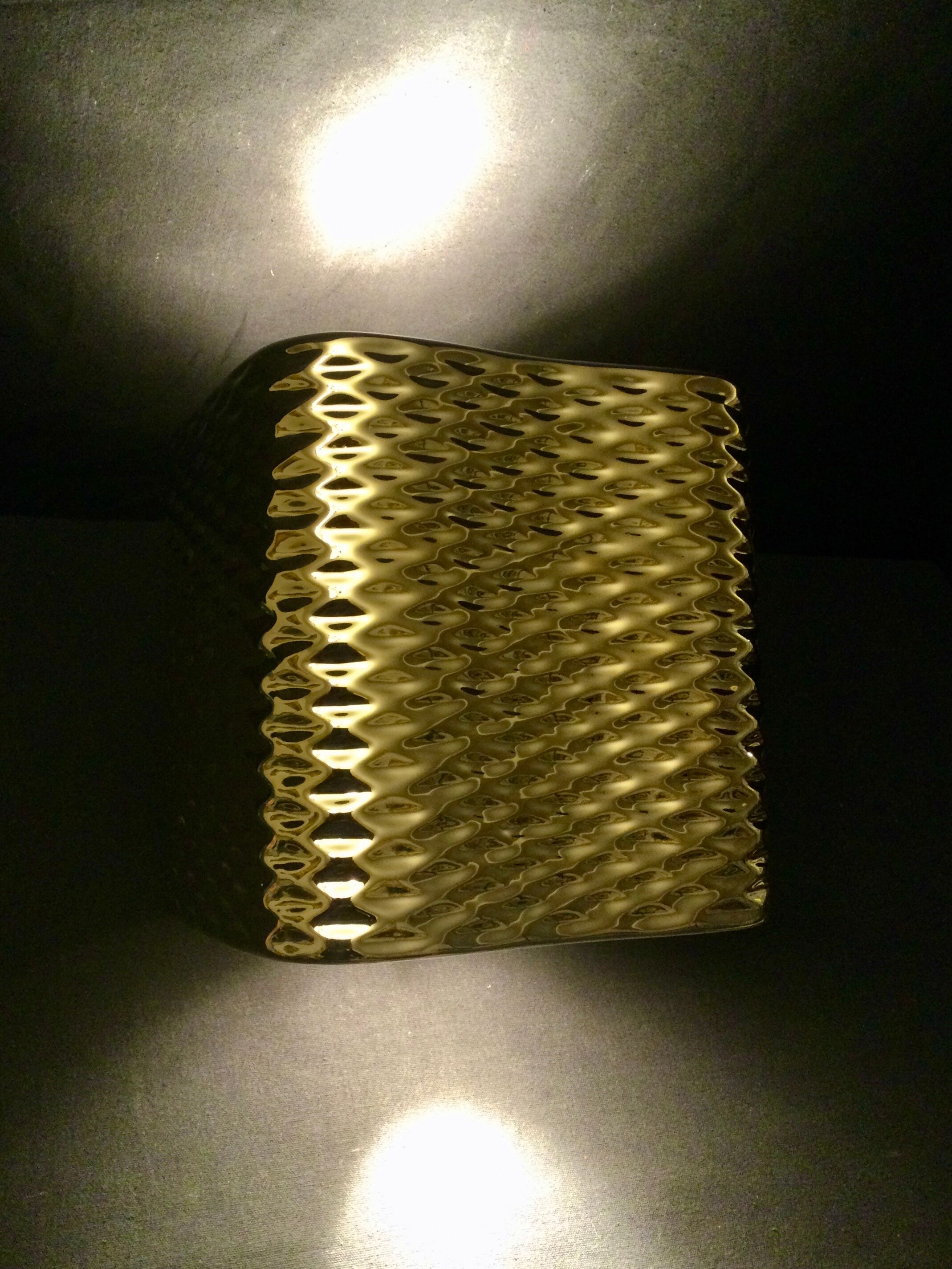 Golden ceramic cube wall light