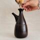 Small vintage Franco Pozzi textured stoneware vase carafe